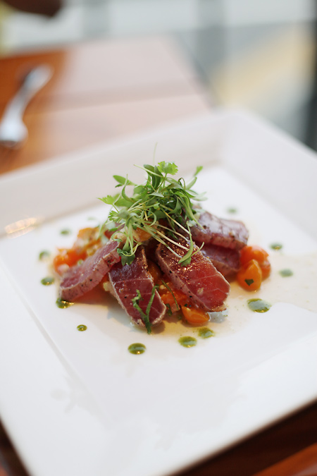yellowfin tuna with yuzu, shiso, cilantro sprouts, tomato 'ceviche'